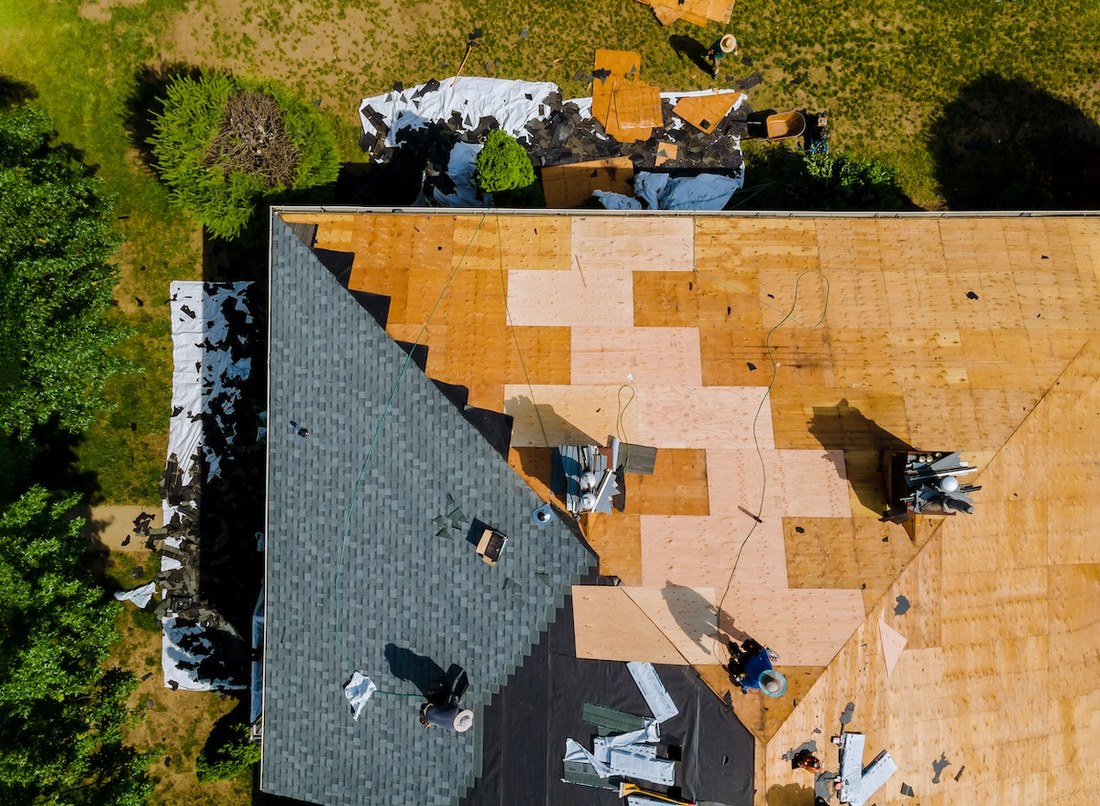 A roof replacement in progress seen from above
